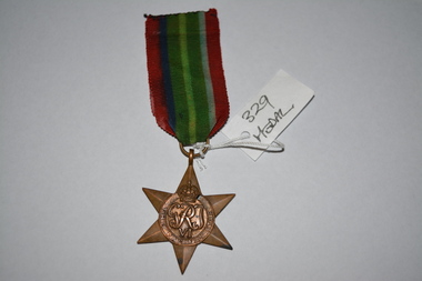 Medal, M Carey