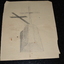 Hand drawn sketch in pencil of grave with cross on cream coloured paper