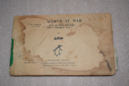 Book without cover containing 60 plus cream coloured pages of cartoons 