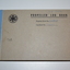 Grey cardboard book with spine bound in blue fabric