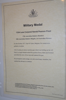 Cream coloured paper with Australian Coat of Arms above black type contained in black border.