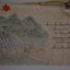 Cream paper envelope with coloured drawing of path leading to three mountains.