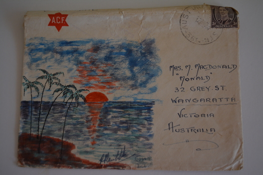 Cream paper envelope with coloured picture of sun setting over water with palm trees in foreground