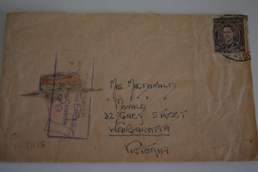 Cream paper envelope with drawing of side profile of male wearing hat.