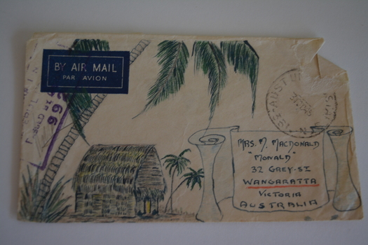 Cream paper envelope with sketch of palm trees and hut on left of scroll.
