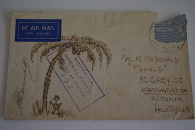 Cream paper envelope with brown coloured sketch of palm tree with stick figure at base.  Signature left of sketch