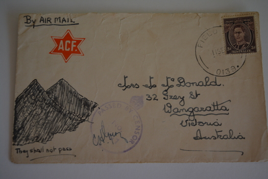 Cream paper envelope with hand sketch of two mountains