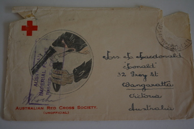Cream paper envelope with a circular sketch of an eagle holding shell/bomb 