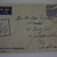 Cream paper envelope with handwritten address, censor stamp and sticker. 