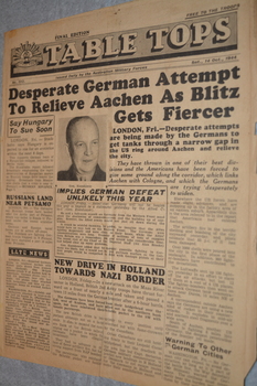 Four page cream coloured newspaper with rising sun badge top left corner of heading 