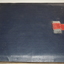 Dark Blue leather bound album with red leather strap and silver plastic clasp