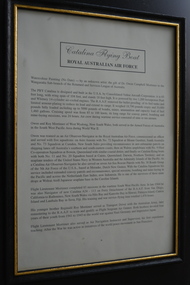 Black frame with gold painted inner edge containing cream coloured paper with black text.
