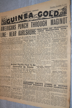 Two page cream coloured newspaper with black print.