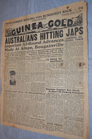 Two page cream coloured newspaper with black print and photograph.