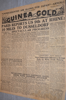 Two page cream coloured newspaper with black print.