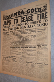 Two page cream coloured newspaper with black print.