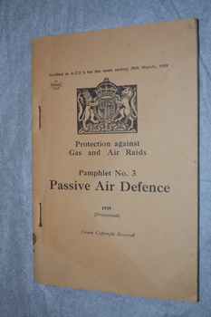 Cream coloured cardboard booklet  with black print on cover