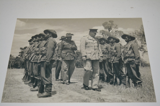  Black and white photograph of inspection of soldiers