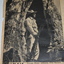  Four black and white newspaper articles with photographs adhered to cream paper