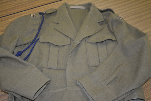 Army khaki cloth battle jacket with blue lanyard