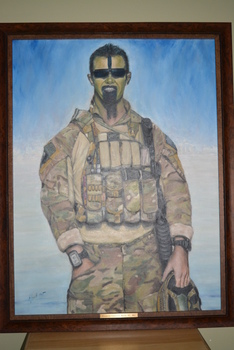 Watercolour painting of soldier wearing camouflaged uniform with  full vest