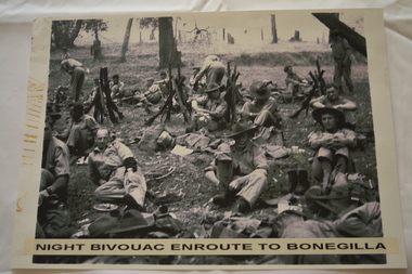 Group of soldiers sitting on the ground