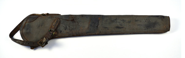 Long cylinder shape made from dark brown leather with leather strap and  brass buckle at the top of the bucket which attaches it to a saddle