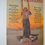 Colour poster of woman in tattered clothes with children at her feet