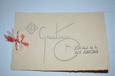 Folded cream cardboard with irregular edging with wording in black print on front cover and inside back cover.  