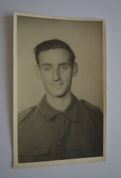 Two black and white photographs one of soldier and one of white cross in cemetery.