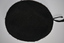 Black wool with leather trim and ribbon beret with white metal badge of coat of arms attached
