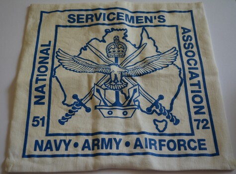 Square shaped cushion cover in cream cotton material with emblem stamped in blue and three buttons on rear side