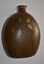 Brown painted aluminium kidney shaped water canteen.