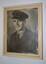 Cream colour frame containing black and white photograph of serviceman in Army uniform.