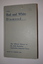 Dark blue hardback covered book with gold lettering on cover and spine.  The book is cover is encased in clear plastic.