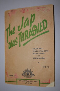 Cream colour cardboard soft cover booklet with green and black writing and crest on front cover.