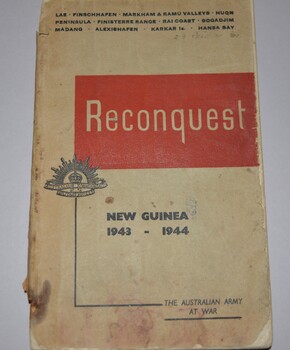 Soft cover booklet  containing 160 pages including maps and photographs.  Cover is cream colour cardboard with black print and rising sun crest.