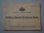 Cream paper booklet with crest and lettering in black ink on front cover containing 20  pages