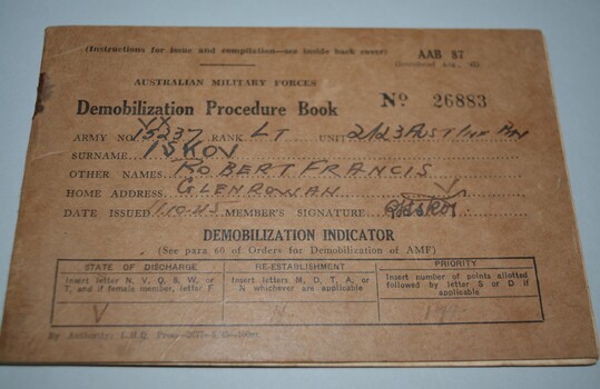  Brown cardboard booklet with  lettering in black ink on front cover containing 32  pages