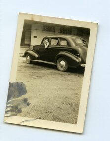 Photograph- girl and car
