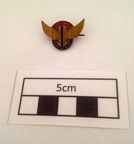 Badge, A.G. Stokes