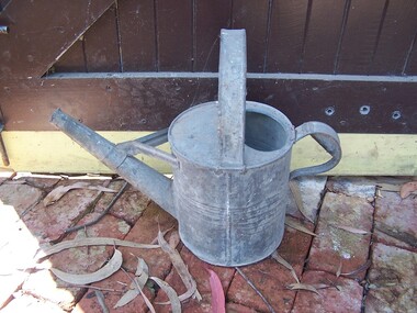 Watering Can with a large spout