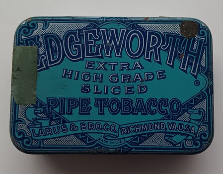 Tin with blue lid for Edgeworth Extra High Grade Sliced Pipe Tobacco.