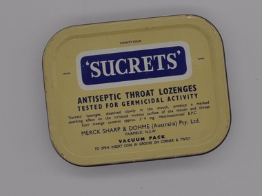 Cream lid, with blue and white "Sucrets' logo with instructional and manufacturer text.