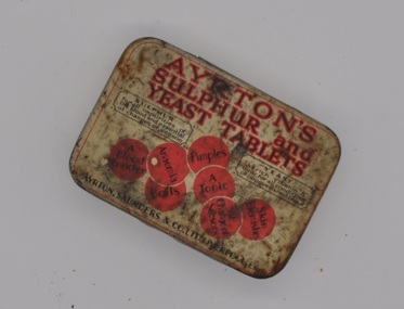 Cream lid with red circles advertising Ayrton's Sulphur and Yeast Tablets.