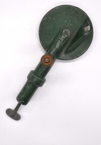 Green bean slicer. The image shows the opening through which beans are passed to approach the cutting blades in the top right of the image.