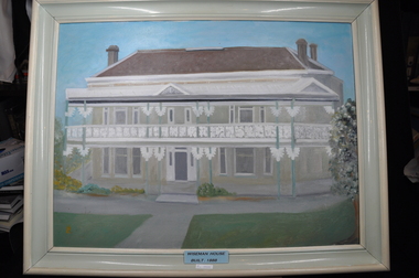 Double Story house with a brown roof.