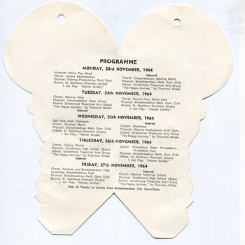 Die-cut cream paper programme opened flat, resembling a fan shape with rounded lobes and a central fold. Black printed text lists a multi-day programme for the Broadmeadows Festival of Arts, dated Monday 23rd November to Friday 27th November 1964, including choirs, orchestras, gymnastic groups, and theatrical performances. A small circular hole is visible near the top
