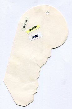 Reverse side of the programme showing plain cream paper with visible ageing, creases, and edge wear. Several adhesive labels are attached, including “WI-0158,” “1486,” and a partially obscured code. The die-cut shape and punched hole are visible.