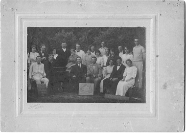 Sepia, Chelsea Coo-ee's Social Club group of 22, men and women. Taken in 1914